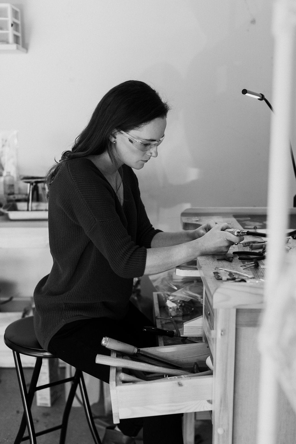 Sanding jewelry at my studio desk using my foredom flex shaft